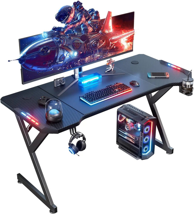 HLDIRECT 55 Inch Gaming Desk with LED Lights Ergonomic Computer Gaming Table with Carbon Fibre Surface Sturdy PC Workstation Desk for Gaming and Home Office with Headphone Hook Cup Holder Black - Gadgetmanic.com